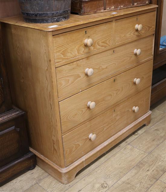 A pine chest of five drawers W.105cm